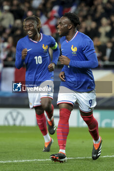 2024-03-25 - Arnaud Kalimuendo of France celebrates his goal with Manu Kone (left) during the International Under 23 Friendly football match between France U23 and United States, USA U23 on March 25, 2024 at Stade Auguste Bonal in Sochaux Montbeliard, France - FOOTBALL - U23 FRIENDLY GAME - FRANCE V USA - FRIENDLY MATCH - SOCCER
