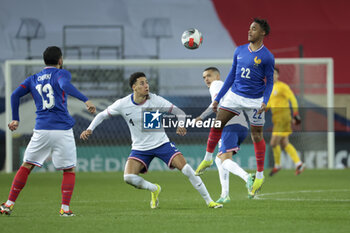 2024-03-25 - Wilson Odobert of France, left Jonathan Tomkinson of USA during the International Under 23 Friendly football match between France U23 and United States, USA U23 on March 25, 2024 at Stade Auguste Bonal in Sochaux Montbeliard, France - FOOTBALL - U23 FRIENDLY GAME - FRANCE V USA - FRIENDLY MATCH - SOCCER