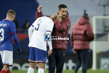 2024-03-25 - Coach of USA Marko Mitrovic salutes Cade Cowell of USA following the International Under 23 Friendly football match between France U23 and United States, USA U23 on March 25, 2024 at Stade Auguste Bonal in Sochaux Montbeliard, France - FOOTBALL - U23 FRIENDLY GAME - FRANCE V USA - FRIENDLY MATCH - SOCCER