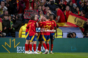 2024-03-26 - Dani Olmo of Spain (C) celebrates his goal with his teammates during the friendly football match among the national teams of Spain and Brazil at Estadio Santiago Bernabeu, Madrid. - SPAIN VS BRAZIL - FRIENDLY MATCH - SOCCER