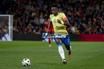 2024-03-26 - Vinicius Junior of Brazil in action with the ball during the friendly football match among the national teams of Spain and Brazil at Estadio Santiago Bernabeu, Madrid. - SPAIN VS BRAZIL - FRIENDLY MATCH - SOCCER