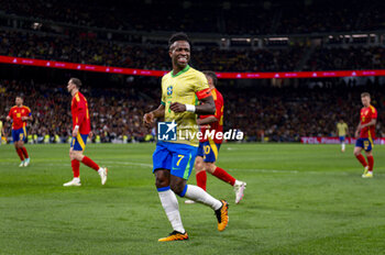 2024-03-26 - Vinicius Junior of Brazil smiles during the friendly football match among the national teams of Spain and Brazil at Estadio Santiago Bernabeu, Madrid. - SPAIN VS BRAZIL - FRIENDLY MATCH - SOCCER
