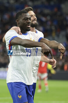 2024-03-26 - Youssouf Fofana of France celebrates his goal with Olivier Giroud of France during the International Friendly football match between France and Chile on March 26, 2024 at Stade Velodrome in Marseille, France - FOOTBALL - FRIENDLY GAME - FRANCE V CHILE - FRIENDLY MATCH - SOCCER