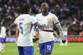 2024-03-26 - Randal Kolo Muani of France celebrates his goal with Jules Kounde during the International Friendly football match between France and Chile on March 26, 2024 at Stade Velodrome in Marseille, France - FOOTBALL - FRIENDLY GAME - FRANCE V CHILE - FRIENDLY MATCH - SOCCER