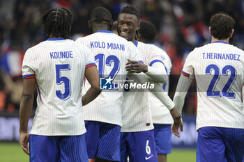 2024-03-26 - Randal Kolo Muani of France #12 celebrates his goal with Eduardo Camavinga during the International Friendly football match between France and Chile on March 26, 2024 at Stade Velodrome in Marseille, France - FOOTBALL - FRIENDLY GAME - FRANCE V CHILE - FRIENDLY MATCH - SOCCER