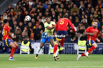 2024-03-26 - Vinicius Junior of Brazil and Robin Le Normand of Spain during the International friendly football match between Spain and Brazil on March 26, 2024 at Santiago Bernabeu stadium in Madrid, Spain - FOOTBALL - FRIENDLY GAME - SPAIN V BRAZIL - FRIENDLY MATCH - SOCCER