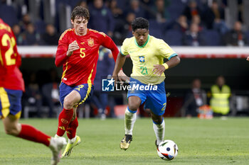 2024-03-26 - Endrick Felipe of Brazil and Robin Le Normand of Spain during the International friendly football match between Spain and Brazil on March 26, 2024 at Santiago Bernabeu stadium in Madrid, Spain - FOOTBALL - FRIENDLY GAME - SPAIN V BRAZIL - FRIENDLY MATCH - SOCCER