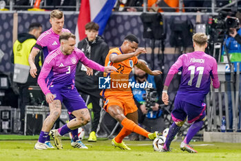 2024-03-26 - David Raum of Germany battles for the ball with Denzel Dumfries of Netherlands during the International Friendly football match between Germany and Netherlands on March 26, 2024 at Deutsche Bank Park in Frankfurt am Main, Germany - FOOTBALL - FRIENDLY GAME - GERMANY V NETHERLANDS - FRIENDLY MATCH - SOCCER