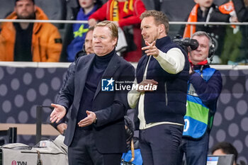 2024-03-26 - Head Coach Ronald Koeman of Netherlands talks to Head Coach Julian Nagelsmann of Germany during the International Friendly football match between Germany and Netherlands on March 26, 2024 at Deutsche Bank Park in Frankfurt am Main, Germany - FOOTBALL - FRIENDLY GAME - GERMANY V NETHERLANDS - FRIENDLY MATCH - SOCCER