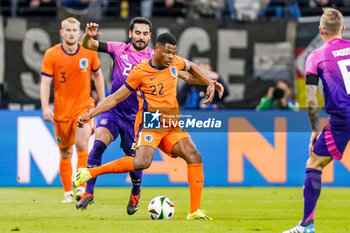 2024-03-26 - Denzel Dumfries of Netherlands is challenged by İlkay Gündoğan of Germany during the International Friendly football match between Germany and Netherlands on March 26, 2024 at Deutsche Bank Park in Frankfurt am Main, Germany - FOOTBALL - FRIENDLY GAME - GERMANY V NETHERLANDS - FRIENDLY MATCH - SOCCER