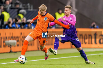2024-03-26 - Jerdy Schouten of Netherlands is challenged by Waldemar Anton of Germany during the International Friendly football match between Germany and Netherlands on March 26, 2024 at Deutsche Bank Park in Frankfurt am Main, Germany - FOOTBALL - FRIENDLY GAME - GERMANY V NETHERLANDS - FRIENDLY MATCH - SOCCER