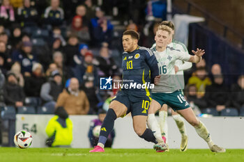 2024-03-26 - Che Adams of Scotland and Alistair McCann of Northern Ireland during the International Friendly football match between Scotland and Northern Ireland on 26 March 2024 at Hampden Park in Glasgow, Scotland - FOOTBALL - FRIENDLY GAME - SCOTLAND V NORTHERN IRELAND - FRIENDLY MATCH - SOCCER