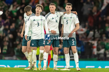 2024-03-26 - Northern Ireland Players Trai Hume, Paddy McNair, Danoel Ballard & Eoin Toal celebrate their 1-0 victory during the International Friendly football match between Scotland and Northern Ireland on 26 March 2024 at Hampden Park in Glasgow, Scotland - FOOTBALL - FRIENDLY GAME - SCOTLAND V NORTHERN IRELAND - FRIENDLY MATCH - SOCCER