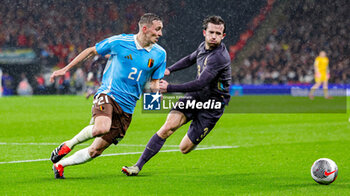 2024-03-27 - Timothy Castagne of Belgium and Ben Chilwell (3) of England during the International Friendly football match between England and Belgium on 26 March 2024 at Wembley Stadium in London, England - FOOTBALL - FRIENDLY GAME - ENGLAND V BELGIUM - FRIENDLY MATCH - SOCCER