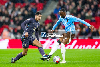 2024-03-27 - Jude Bellingham (10) of England and Dodi Lukebakio of Belgium during the International Friendly football match between England and Belgium on 26 March 2024 at Wembley Stadium in London, England - FOOTBALL - FRIENDLY GAME - ENGLAND V BELGIUM - FRIENDLY MATCH - SOCCER