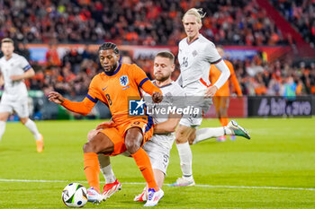 2024-06-10 - Georginio Wijnaldum of Netherlands battles for the ball with Sverrir Ingason of Iceland during the International Friendly football match between Netherlands and Iceland on June 10, 2024 at Stadion Feijenoord de Kuip in Rotterdam, Netherlands - FOOTBALL - FRIENDLY GAME - NETHERLANDS V ICELAND - FRIENDLY MATCH - SOCCER