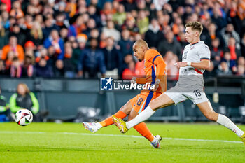2024-06-10 - Donyell Malen of Netherlands shoots to score during the International Friendly football match between Netherlands and Iceland on June 10, 2024 at Stadion Feijenoord de Kuip in Rotterdam, Netherlands - FOOTBALL - FRIENDLY GAME - NETHERLANDS V ICELAND - FRIENDLY MATCH - SOCCER