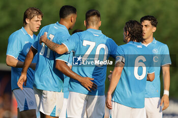 2024-07-16 - Napoli's Italian midfielder Gianluca Gaetano celebrates after scoring a goal with team mate during friendly match SSC Napoli Anaune val di Non SSC Napoli's 2024-25 preseason training camp in val di sole in Trentino, Dimaro Folgarida

 - NAPOLI VS ANAUNE VAL DI NON - FRIENDLY MATCH - SOCCER