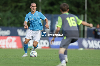 2024-07-16 - Napoli's Norwegian defender Leo Ostigard controls the ball during friendly match SSC Napoli Anaune val di Non SSC Napoli's 2024-25 preseason training camp in val di sole in Trentino, Dimaro Folgarida

 - NAPOLI VS ANAUNE VAL DI NON - FRIENDLY MATCH - SOCCER