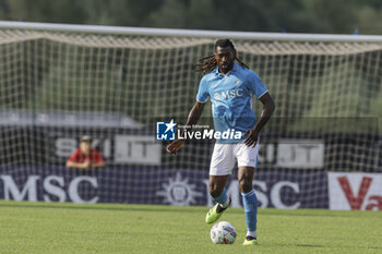 2024-07-16 - Napoli's Cameroonian midfielder Andre Frank Zambo Anguissa controls the ball during friendly match SSC Napoli Anaune val di Non SSC Napoli's 2024-25 preseason training camp in val di sole in Trentino, Dimaro Folgarida

 - NAPOLI VS ANAUNE VAL DI NON - FRIENDLY MATCH - SOCCER