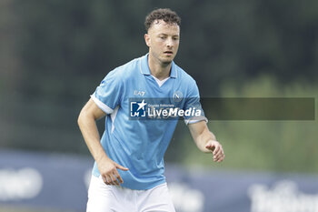 2024-07-16 - Napoli's Kosovar defender Amir Rrahmani looks during friendly match SSC Napoli Anaune val di Non SSC Napoli's 2024-25 preseason training camp in val di sole in Trentino, Dimaro Folgarida

 - NAPOLI VS ANAUNE VAL DI NON - FRIENDLY MATCH - SOCCER