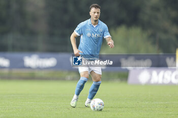 2024-07-16 - Napoli's Kosovar defender Amir Rrahmani looks during friendly match SSC Napoli Anaune val di Non SSC Napoli's 2024-25 preseason training camp in val di sole in Trentino, Dimaro Folgarida

 - NAPOLI VS ANAUNE VAL DI NON - FRIENDLY MATCH - SOCCER