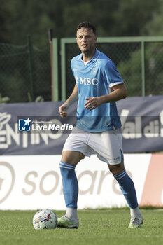 2024-07-16 - Napoli's Kosovar defender Amir Rrahmani controls the ball during friendly match SSC Napoli Anaune val di Non SSC Napoli's 2024-25 preseason training camp in val di sole in Trentino, Dimaro Folgarida

 - NAPOLI VS ANAUNE VAL DI NON - FRIENDLY MATCH - SOCCER