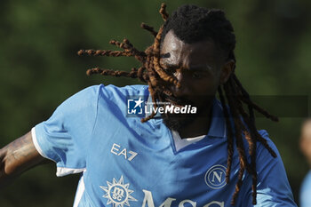 2024-07-16 - Napoli's Cameroonian midfielder Andre Frank Zambo Anguissa looks during friendly match SSC Napoli Anaune val di Non SSC Napoli's 2024-25 preseason training camp in val di sole in Trentino, Dimaro Folgarida

 - NAPOLI VS ANAUNE VAL DI NON - FRIENDLY MATCH - SOCCER