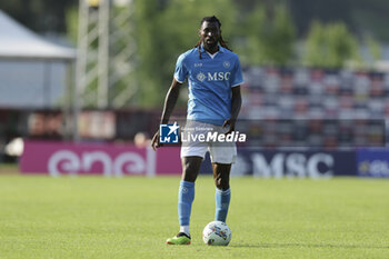 2024-07-16 - Napoli's Cameroonian midfielder Andre Frank Zambo Anguissa controls the ball during friendly match SSC Napoli Anaune val di Non SSC Napoli's 2024-25 preseason training camp in val di sole in Trentino, Dimaro Folgarida

 - NAPOLI VS ANAUNE VAL DI NON - FRIENDLY MATCH - SOCCER