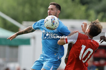 2024-07-20 - Napoli's Italian forward Matteo Politano challenges for the ball with Mantova's Italian midfielder David Wieser during friendly match SSC Napoli vs Mantova in SSC Napoli's 2024-25 preseason training camp in val di sole in Trentino, Dimaro Folgarida

 - NAPOLI VS MANTOVA - FRIENDLY MATCH - SOCCER