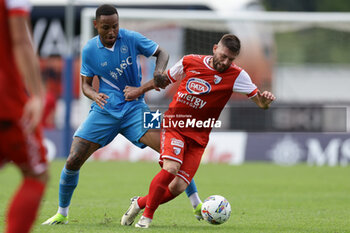 2024-07-20 - Napoli's Brazilian defender Natan challenges for the ball with Mantova's Italian forward Francesco Galuppini during friendly match SSC Napoli vs Mantova in SSC Napoli's 2024-25 preseason training camp in val di sole in Trentino, Dimaro Folgarida

 - NAPOLI VS MANTOVA - FRIENDLY MATCH - SOCCER