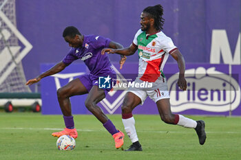 2024-07-19 - ACF Fiorentina's defender Michael Kayode against AC Reggiana's forward Cedric Gondo - ACF FIORENTINA VS AC REGGIANA - FRIENDLY MATCH - SOCCER