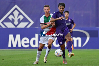 2024-07-19 - ACF Fiorentina's defender Luca Ranieri against AC Reggiana's forward Luca Vido - ACF FIORENTINA VS AC REGGIANA - FRIENDLY MATCH - SOCCER