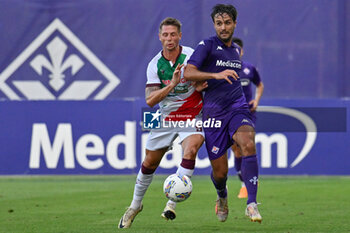 2024-07-19 - ACF Fiorentina's defender Luca Ranieri against AC Reggiana's forward Luca Vido - ACF FIORENTINA VS AC REGGIANA - FRIENDLY MATCH - SOCCER