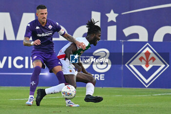 2024-07-19 - ACF Fiorentina's defender Cristiano Biraghi agains AC Reggiana's forward Cedric Gondo - ACF FIORENTINA VS AC REGGIANA - FRIENDLY MATCH - SOCCER