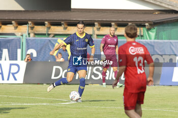 2024-07-17 - Daniele Ghilardi of Hellas Verona play the ball during Hellas Verona FC vs Top 22 Dilettanti Verona, 1° Test Match, at Centro Sportivo 'La Pineta' on Folgaria (TN), on July 17, 2024. - HELLAS VERONA FC VS TOP 22 DILETTANTI VERONA - FRIENDLY MATCH - SOCCER