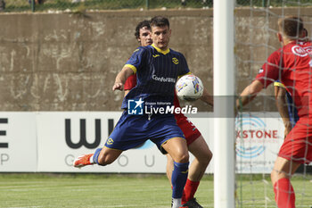 2024-07-17 - Giangiacomo Magnani of Hellas Verona kick the ball during Hellas Verona FC vs Top 22 Dilettanti Verona, 1° Test Match, at Centro Sportivo 'La Pineta' on Folgaria (TN), on July 17, 2024. - HELLAS VERONA FC VS TOP 22 DILETTANTI VERONA - FRIENDLY MATCH - SOCCER