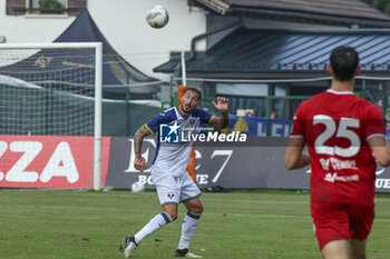 2024-07-24 - Federico Ceccerini of Hellas Verona heads the ball1 during Hellas Verona FC vs Virtus Verona FC, 3° Test Match, at Centro Sportivo 'La Pineta' on Folgaria (TN), on July 24, 2024. - HELLAS VERONA FC VS VIRTUS VERONA - FRIENDLY MATCH - SOCCER