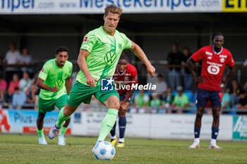 2024-07-24 - Kevin Behrens (VfL Wolfsburg) scores a goal 1-0 during the Friendly football match between VfL Wolfsburg and LOSC Lille on 24 July 2024 at Jahnstadion in Rheda-Wiedenbrück, Germany - FOOTBALL - FRIENDLY GAME - WOLFSBURG V LILLE - FRIENDLY MATCH - SOCCER