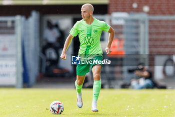 2024-07-24 - Jakub Kaminski (VfL Wolfsburg) during the Friendly football match between VfL Wolfsburg and LOSC Lille on 24 July 2024 at Jahnstadion in Rheda-Wiedenbrück, Germany - FOOTBALL - FRIENDLY GAME - WOLFSBURG V LILLE - FRIENDLY MATCH - SOCCER