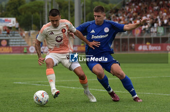 2024-08-03 - Roma's Enzo Le Fee in action against Olympiacos FC Francisco Ortega during the friendly match AS Roma - Olympiacos FC at the 