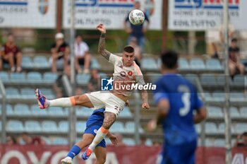 2024-08-03 - Roma's Gianluca Mancini in action against Olympiacos FC Francisco Ortega during the friendly match AS Roma - Olympiacos FC at the 