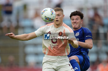 2024-08-03 - Roma's Artem Dovbyk in action against Olympiacos FC Giualian Biancone during the friendly match AS Roma - Olympiacos FC at the 