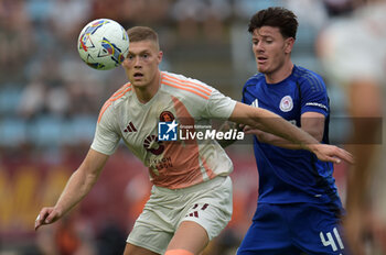 2024-08-03 - Roma's Artem Dovbyk in action against Olympiacos FC Giualian Biancone during the friendly match AS Roma - Olympiacos FC at the 