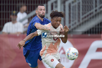 2024-08-03 - Roma's Aboubacar Sangare Traore in action against Olympiacos FC Kristoffer Velde during the friendly match AS Roma - Olympiacos FC at the 