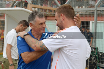 2024-08-03 - Roma's Coach Daniele De Rossi against Olympiacos FC coach Jose Luis Mendilibar during the friendly match AS Roma - Olympiacos FC at the 