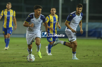 2024-08-03 - Abdou Harroui of Hellas Verona FC play the ball during Hellas Verona FC vs Asteras Tripolis FC, 5° Test Match, at stadio 