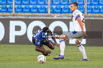 2024-08-04 - Drissa Camara (Parma Calcio) suffers a foul from Rafael Toloi (Atalanta) - PARMA CALCIO VS ATALANTA BC - FRIENDLY MATCH - SOCCER