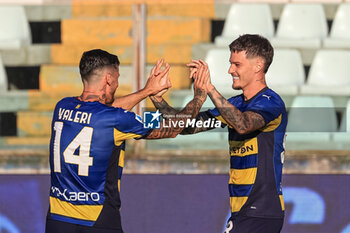 2024-08-04 - Dennis Man (Parma Calcio) celebrates with Emanuele Valeri (Parma Calcio) after a goal - PARMA CALCIO VS ATALANTA BC - FRIENDLY MATCH - SOCCER