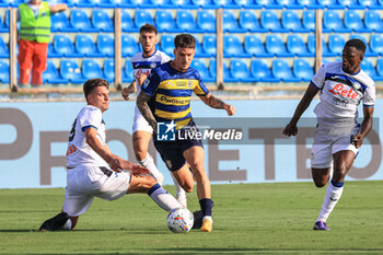 2024-08-04 - Dennis Man (Parma Calcio) fights for the ball - PARMA CALCIO VS ATALANTA BC - FRIENDLY MATCH - SOCCER